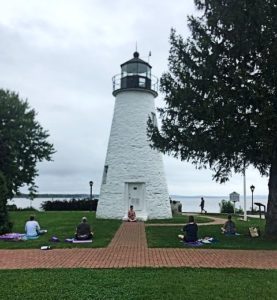 Yoga Class from Yoga Studio 723 donating to the Concord Point Lighthouse in Havre de Grace
