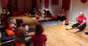 Women's Circle of HdG enjoying yoga and community at Yoga Studio 723.